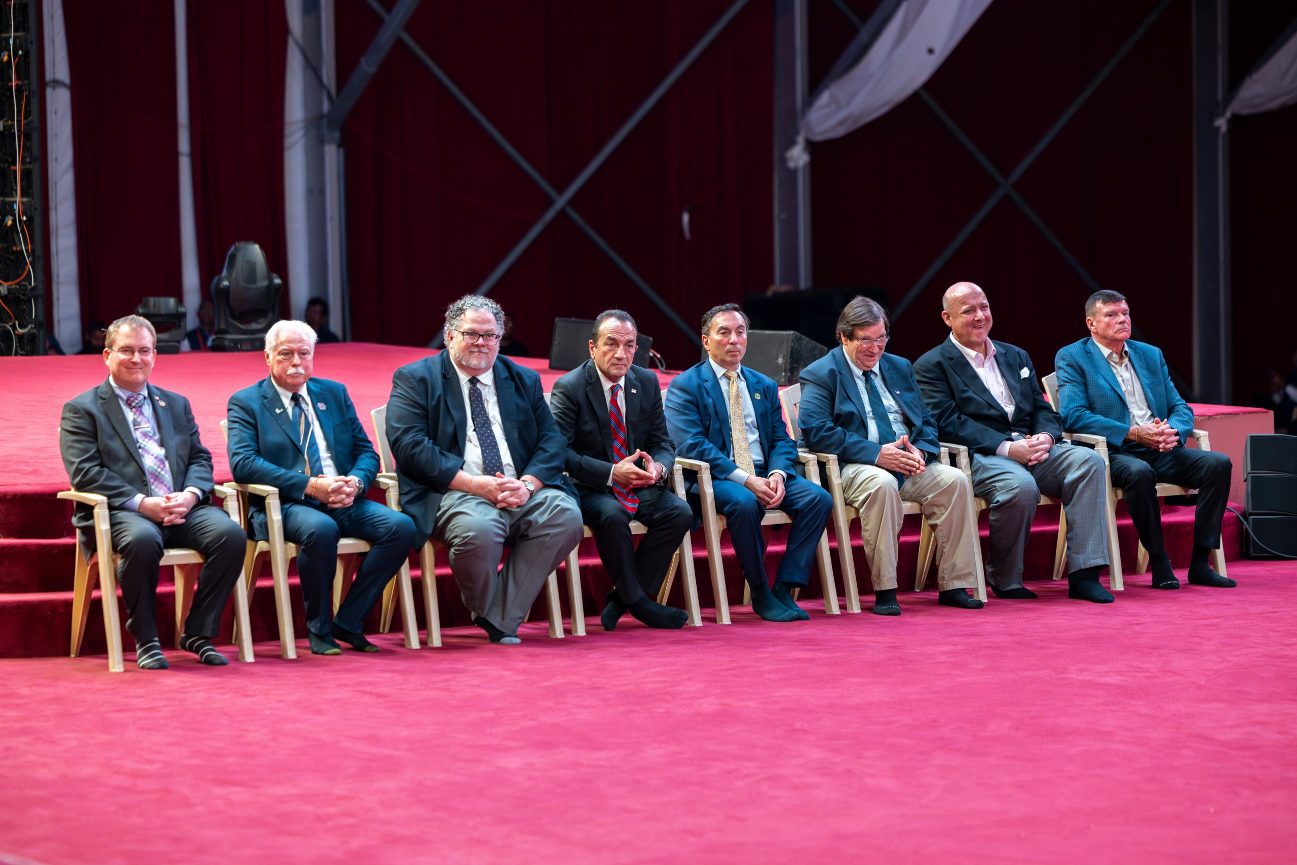Dignitaries and government officials on the stage during the Mayor’s Day celebration at BAPS Swaminarayan Akshardham