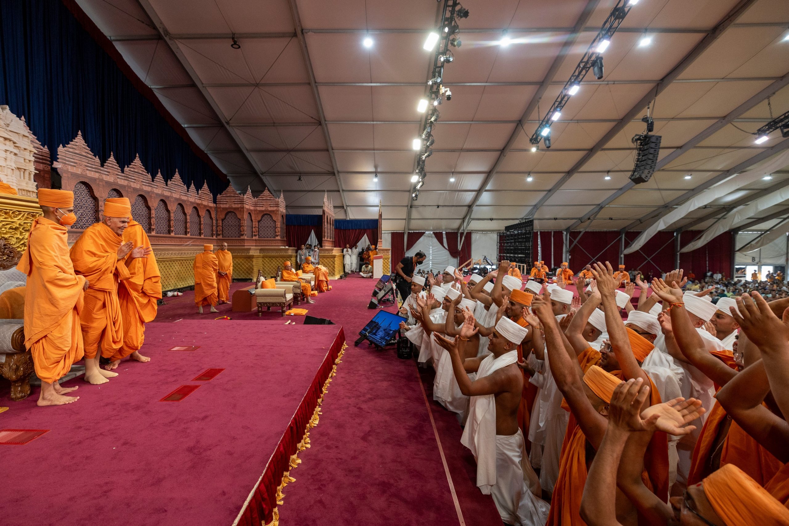 Newly initiated swamis dance in jubilation after taking diksha